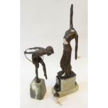 ART DECO STYLE SPELTER FIGURE OF A FEMALE DANCER WITH A HOOP, on green variegated base, 10 ½" (26.