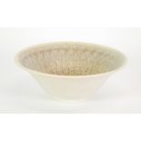 PILKINGTONS ROYAL LANCASTRIAN POTTERY BOWL, conical footed form, matt glazed in mottled tones of