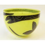 KOSTA BODA, SWEDEN, ULRICA HYDMAN-VALLIEN YELLOW GLASS BOWL, painted in black with a serpent and