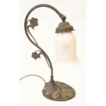 ART NOUVEAU STYLE PATINATED METAL TABLE LAMP, with foliate scrolling stem and pink and white flecked