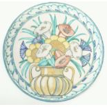 WILLIAM S. MYCOCK, ROYAL LANCASTRIAN TUBE LINED POTTERY WALL PLAQUE, decorated with a basket of