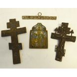 *THREE CAST BRASS 'BRONZED' AND ENAMELLED DEVOTIONAL CRUCIFIXES AND ICON AND ANOTHER ITEM OF CAST