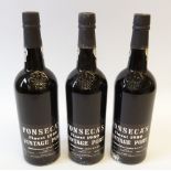 THREE BOTTLES OF FONSECA'S VINTAGE PORT, 1980, with wooden crate, only one board to top (4)