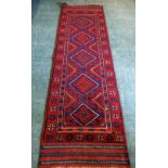 MESHWANI HAND KNOTTED, ALL WOOL, BORDERED EASTERN RUNNER, WITH A ROW OF FIVE DIAMOND SHAPED