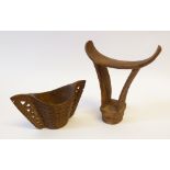 TWO INTERESTING AGED PIECES OF CARVED WOOD, probably Scandinavian comprising a TWO HANDLED WEDDING