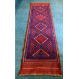 MESHWANI HAND KNOTTED, ALL-WOOL, BORDERED RUNNER WITH A ROW OF DIAMOND SHAPED MEDALLIONS,