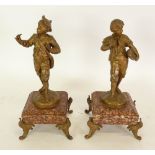 AFTER MOUREAU, PAIR OF EARLY TWENTIETH CENTURY GILT SPELTER FIGURES, modelled as young boys, one
