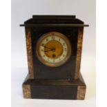 EARLY TWENTIETH CENTURY BLACK SLATE MANTEL CLOCK with variegated marble trim, the 3 1/2" Arabic dial