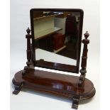 GOOD QUALITY EARLY NINETEENTH CENTURY MAHOGANY TOILET MIRROR, the oblong plate  in a moulded