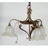 ARTS AND CRAFTS BRASS AND COPPER THREE LIGHT ELECTROLIER, the scroll arms with frosted wrythen