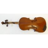 AN EARLY TWENTIETH CENTURY THREE QUARTER SIZE SAXONY VIOLIN COPY OF AN AMATI, bears label and having