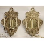 PAIR OF BAROQUE SILVER PLATED ON COPPER GIRANDOLES, each with small cartouche shaped plate within