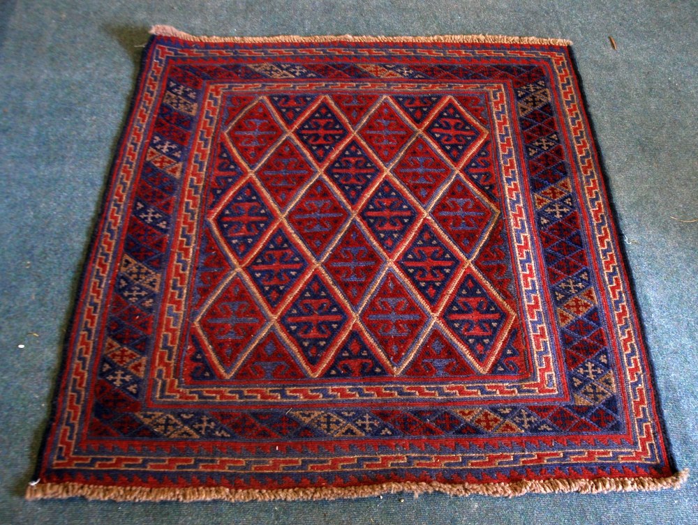 TRIBAL KAZAK HAND KNOTTED BORDERED ALL WOOL RUG, WITH ALL-OVER DIAMOND PATTERN, PRINCIPALLY