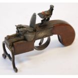 DUNHILL 'TINDER PISTOL' TABLE CIGARETTE LIGHTER, in the form of a flintlock belt pistol, pat.