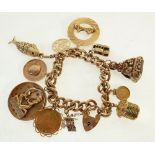 GOLD CURB PATTERN LINK CHARM BRACELET, with 9CT GOLD PADLOCK CLASP, A GOLD FRAMED BEATRIX ZIJ DIE