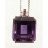 LARGE AMETHYST, DIAMOND AND RUBY PLATINUM SET PENDANT, the large claw set rectangular mixed cut