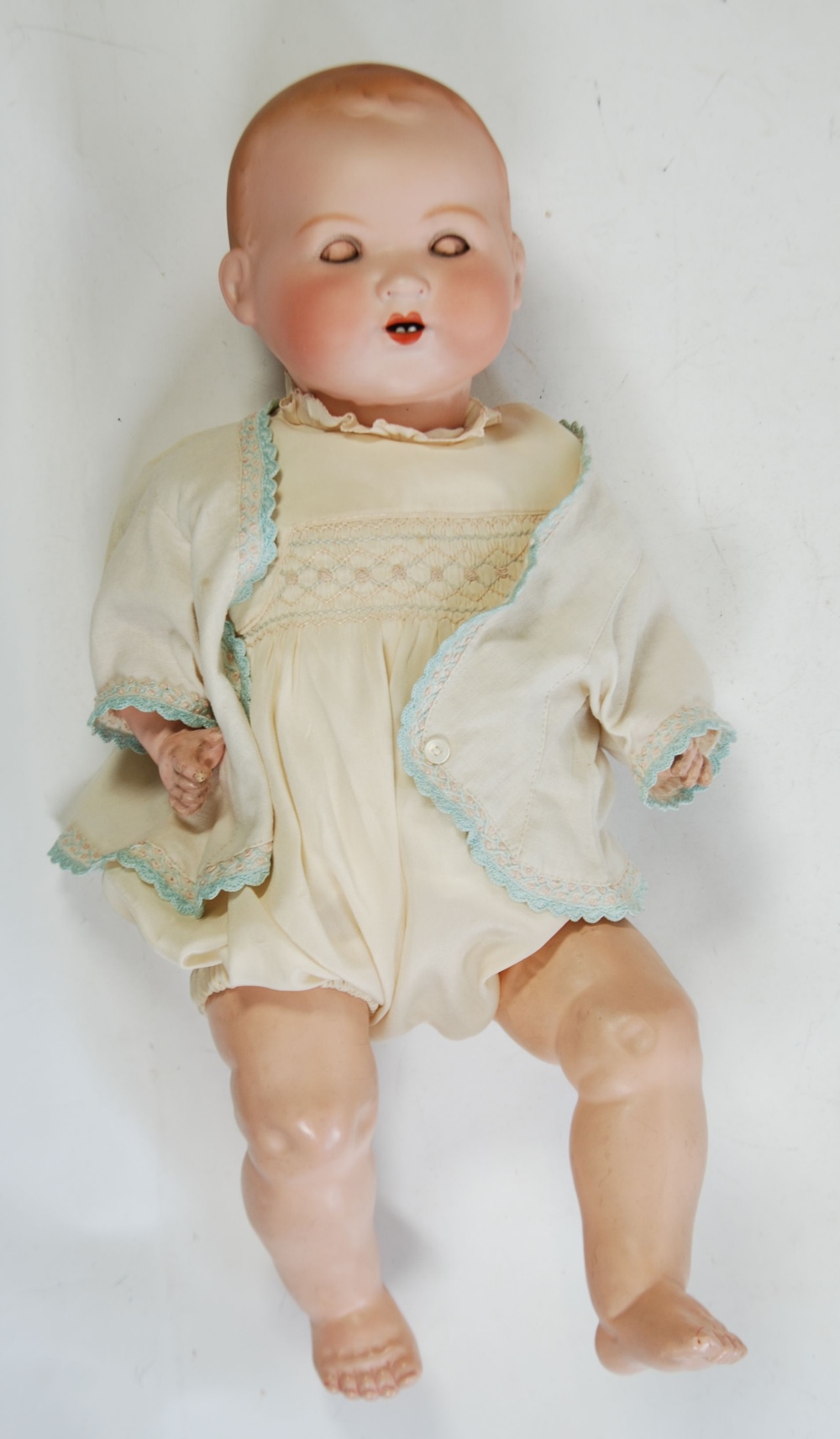 ARMAND MARSEILLE 'DREAM BABY' BISQUE SWIVEL HEADED DOLL, with sleeping blue eyes and open mouth,