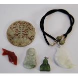 CARVED JADE BUDDAH PENDANT, A CARVED AND PIERCED HARDSTONE DISK AND THREE OTHER HARDSTONE PENDANTS