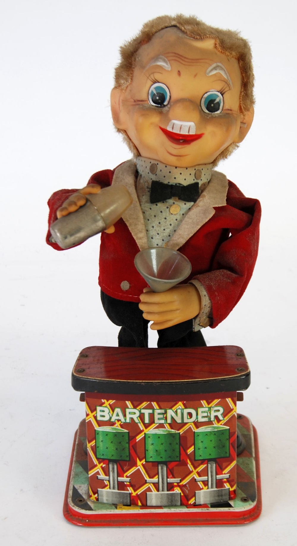 TN, JAPAN, BATTERY POWERED TINPLATE AND FABRIC BARTENDER TOY AUTOMATON, depicted dispensing