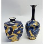 TWO LATE 19th CENTURY BOOTHS POTTERY VASES, both decorated with blue flowers on gilt ground, one