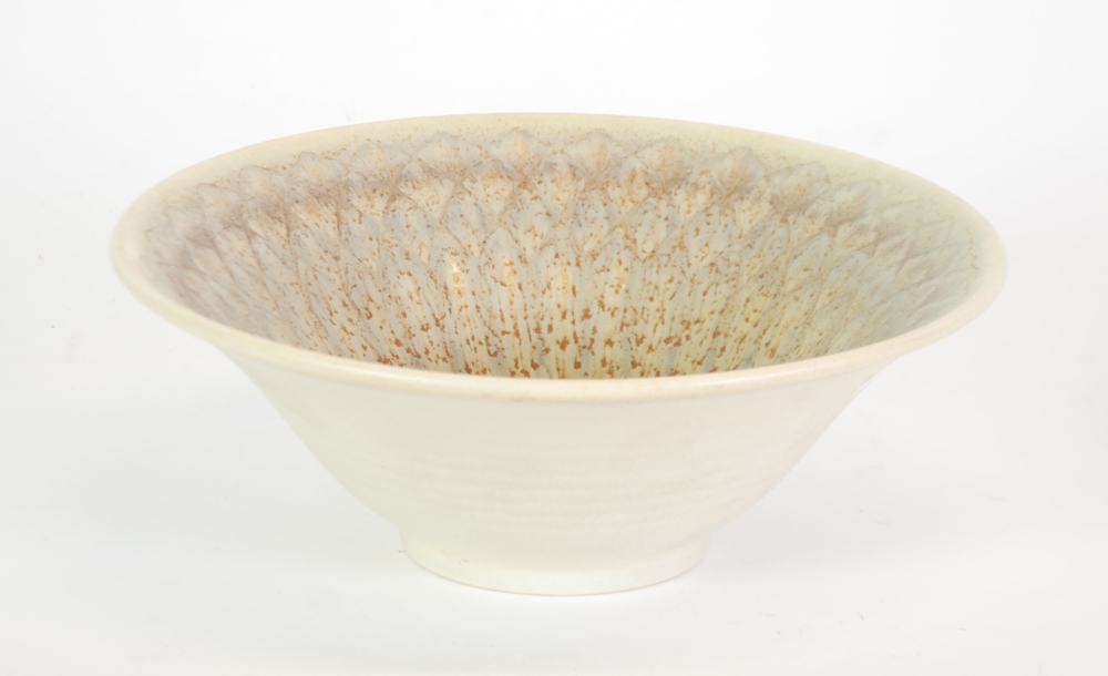 PILKINGTONS ROYAL LANCASTRIAN POTTERY BOWL, conical footed form, matt glazed in mottled tones of