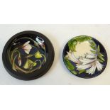 TWO MODERN MOORCROFT TUBE LINED POTTERY COASTERS OR SAUCER DISHES, COMPRISING; 'Wood Sorrel' in