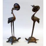 PAIR OF MODERN ORIENTAL BROWN PATINATED BRONZE GROUPS OF STORKS, standing on the back of turtles,