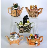 FIVE PAUL CARDEW ONE CUP NOVELTY TEAPOTS, COMPRISING; 'Hikers rest', 'Wash stand', 'Tea Chest', '