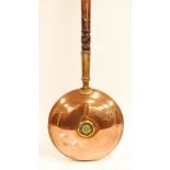 NINETEENTH CENTURY COPPER DISC SHAPED HOT WATER FILLED BED WARMING PAN WITH BRASS SCREW STOPPER