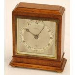 ELLIOTT, MAHOGANY CASED MANTEL CLOCK, retailed by Batty, Manchester, with silvered square Roman dial