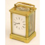 HENRI JACOT (LATE 19th CENTURY FRENCH) PRESENTATION BRASS CHIMING CARRIAGE CLOCK, the white