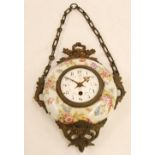 LATE NINETEENTH CENTURY CAST METAL AND ENAMEL CARTEL CLOCK, the circular white enamel case hand