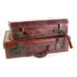 TWO SMALL LEATHER SUITCASES (ONE A.F.)