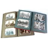 TWO EARLY TWENTIETH CENTURY POSTCARD ALBUMS containing approx 500 postcards, early Twentieth Century