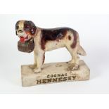 HENNESSY COGNAC PAINTED COMPOSITE ADVERTISING MODEL OF A ST. BERNARD, 10" (25.4cm) high