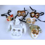 SIX MODERN VIENESE MASKS, COMPRISING; 4 papier mache eye masks and an unpainted Jesters mask, and