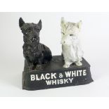 BUCHANAN'S BLACK AND WHITE WHISKEY ENAMELLED CAST METAL BAR TOP ADVERTISING MODEL OF TWO TERRIERS,