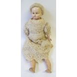 LATE VICTORIAN WAXED COMPOSITION SHOULD HEAD DOLL, with painted eyes, fabric wig, fabric body,