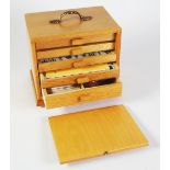 MODERN LIGHT OAK TABLE TOP SMALL CHEST OF FIVE DRAWERS, containing a bamboo backed Mah Jong set