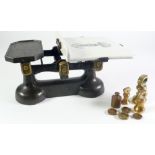 PAIR OF 19TH CENTURY CAST METAL AND CERAMIC PRODUCE SCALES, with  eight various brass workings