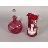 MARY GREGORY STYLE CRANBERRY GLASS JUG, of cylindrical form with swollen base and clear glass loop