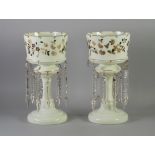 A PAIR OF LARGE VICTORIAN WHITE GLASS LUSTRES with gilt and enamel floral decoration and two tiers