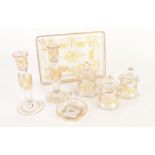 GOOD QUALITY SEVEN PIECE EARLY TWENTIETH CENTURY ETCHED AND GILT GLASS DRESSING TABLE SET, the