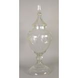 APOTHECARIES LARGE CUT GLASS PEDESTAL JAR AND COVER with cut decoration and spire finial, 31" (78.