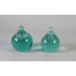 TWO NINETEENTH CENTURY GREEN BUBBLE GLASS INKWELLS WITH STOPPERS, 5" (12.7cm) high (2)