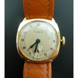 A 9CT GOLD CASED CLORIS GENTLEMANS WRIST WATCH on replaced leather strap, hallmarked Birmingham