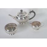 VICTORIAN THREE PIECE SILVER TEA SET, globular with gadroon decoration and wood scroll handle and
