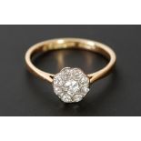 DIAMOND CLUSTER RING, principle stone 0.10ct approx. with a surround of eight small diamonds, 0.25ct