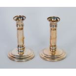 PAIR OF EDWARDIAN SILVER CANDLESTICKS each with trumpet shaped sconce, plain cylindrical column on