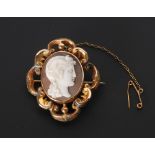 VICTORIAN CAMEO BROOCH, the revolving centre having oval shell cameo depicting a classical female